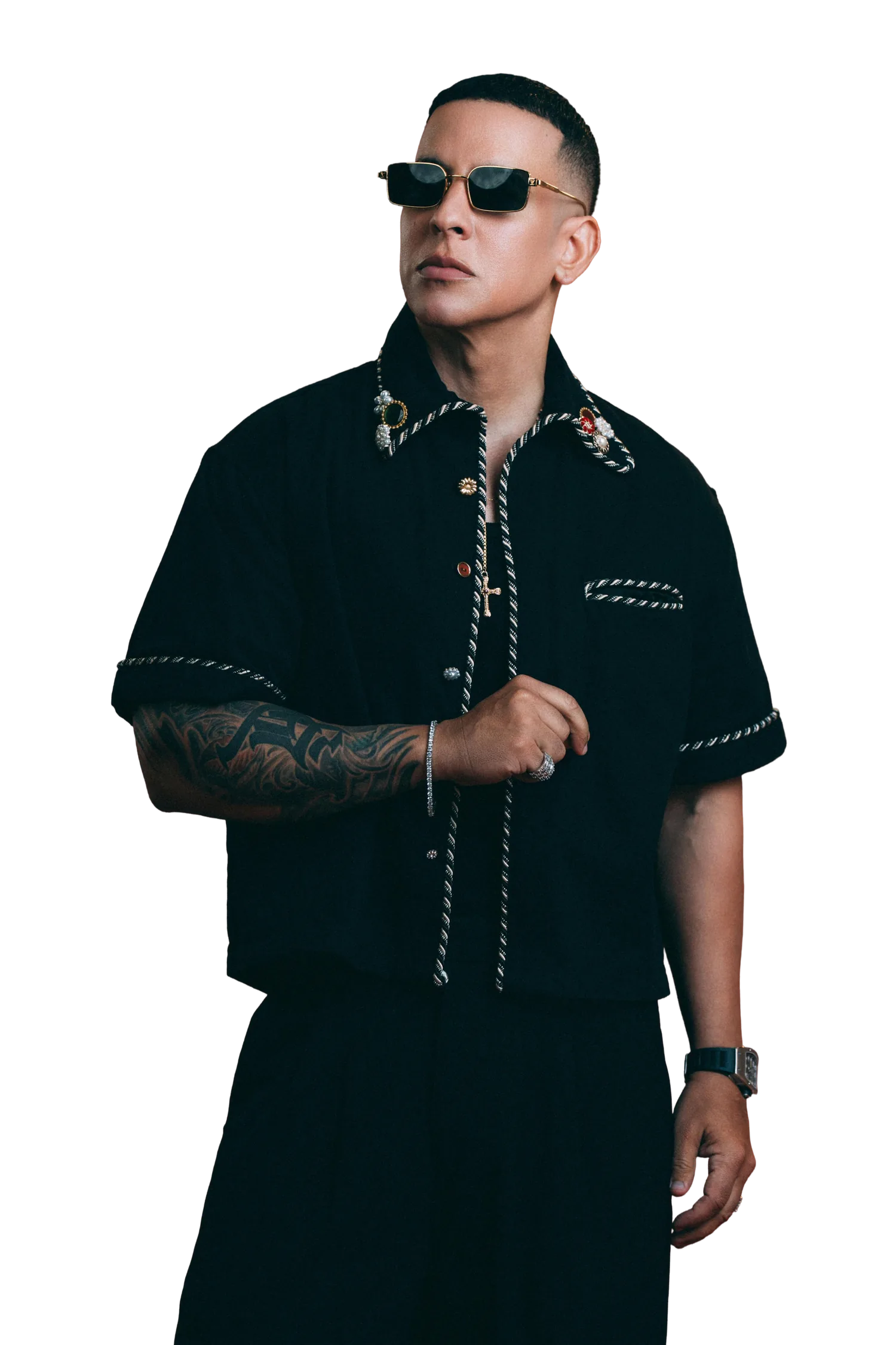 Daddy Yankee in sunglasses and a black embroidered jacket